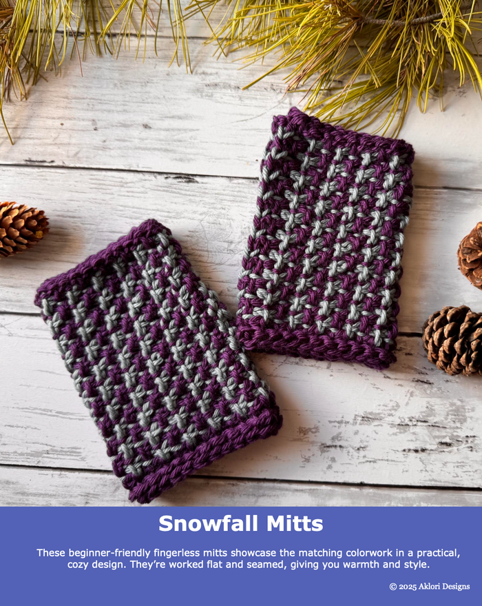 Snowfall Tunisian crochet fingerless mitts pair in purple and gray colorwork laid flat on whitewashed wood with pine branches and pinecones and a purple banner reading Snowfall Mitts by Aklori Designs