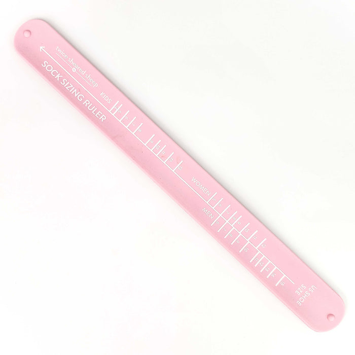 Petal Pink Sock Sizing Ruler flat on a white background showing the full length with Twice Sheared Sheep branding, Kids, Women, and Men size sections, and US Shoe Size markings