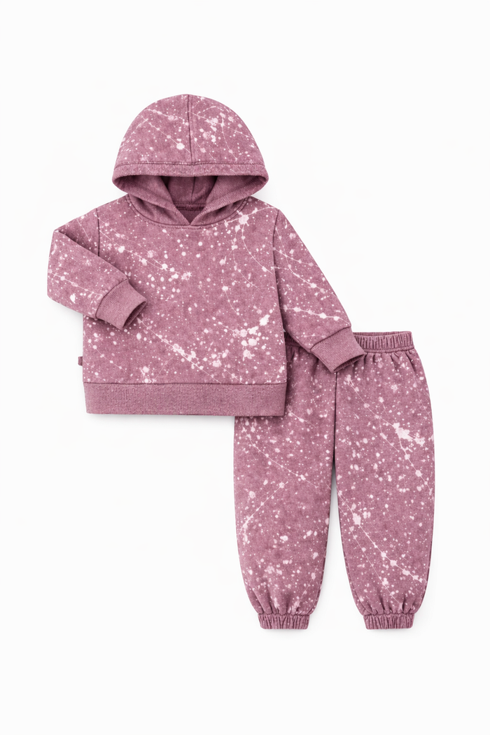 Pink children's hoodie and pants set with star pattern on a white background