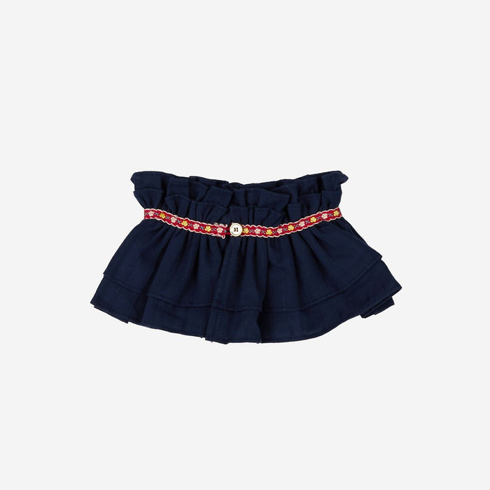 Navy blue neck cuff with a decorative ribbon on a white background