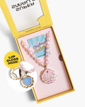 Pink shell-shaped lip gloss with mirror and beads in a box, featuring 'SuperMalls' branding.