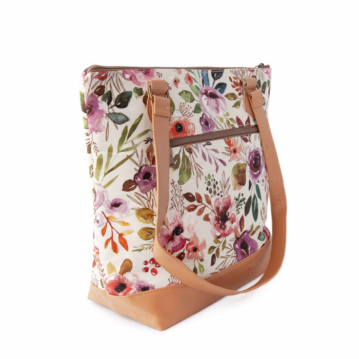 Spring Floral Mega Trinity Bag from top angle showing wide opening with floral fabric and tan leather accents