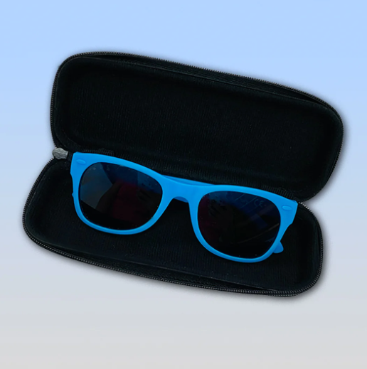 Blue sunglasses in a black case on a light blue background