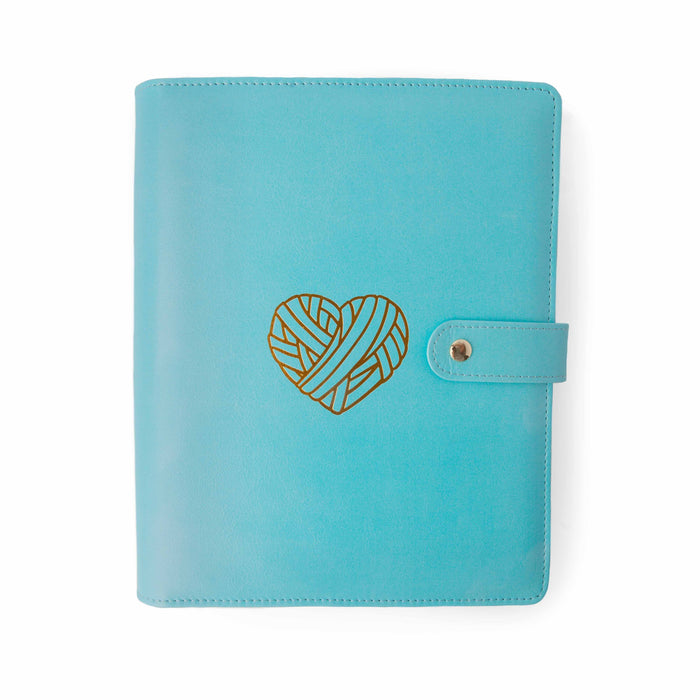 Teal Heart Project Journal Planner front cover in smooth teal faux leather with a gold foil yarn heart design and snap closure