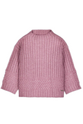 Pink ribbed sweater on a white background