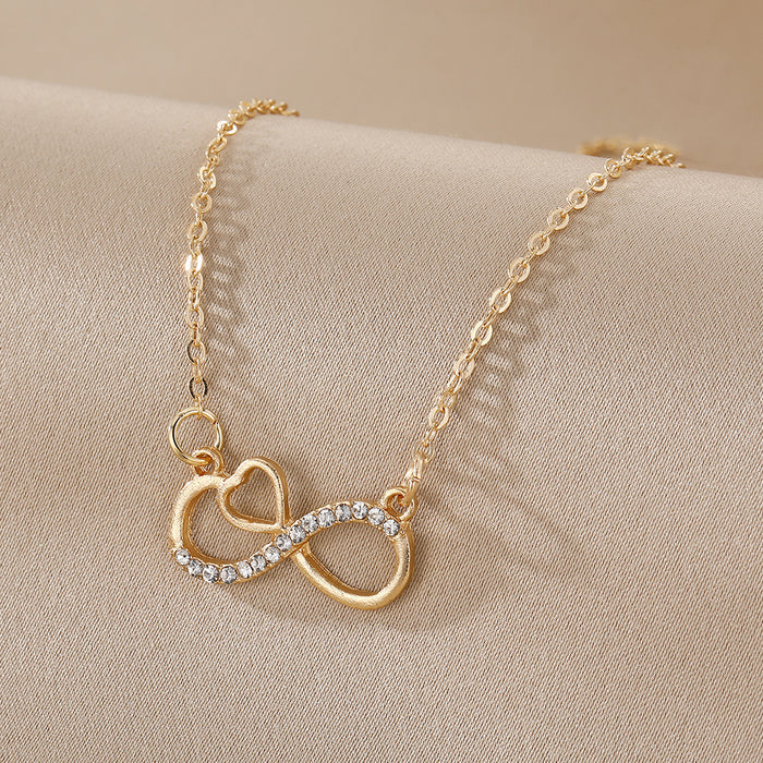 The Eternal Heart – Crystal-Accented Infinity Pendant on O-Link Chain
