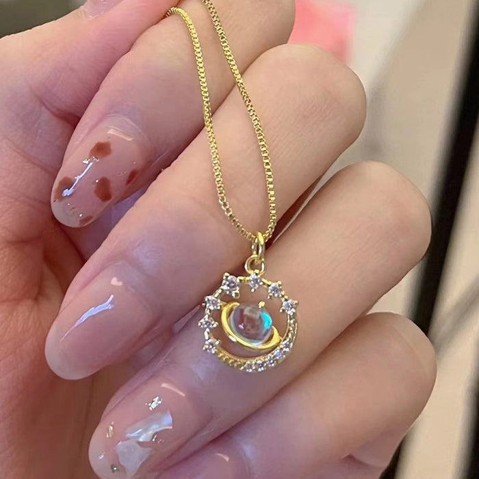 The Saturnia Orbit – Radiant Galaxy Pendant with Crystal Halo