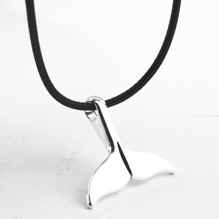 The Voyager Tail – Minimalist Ocean-Inspired Pendant on Braided Leather