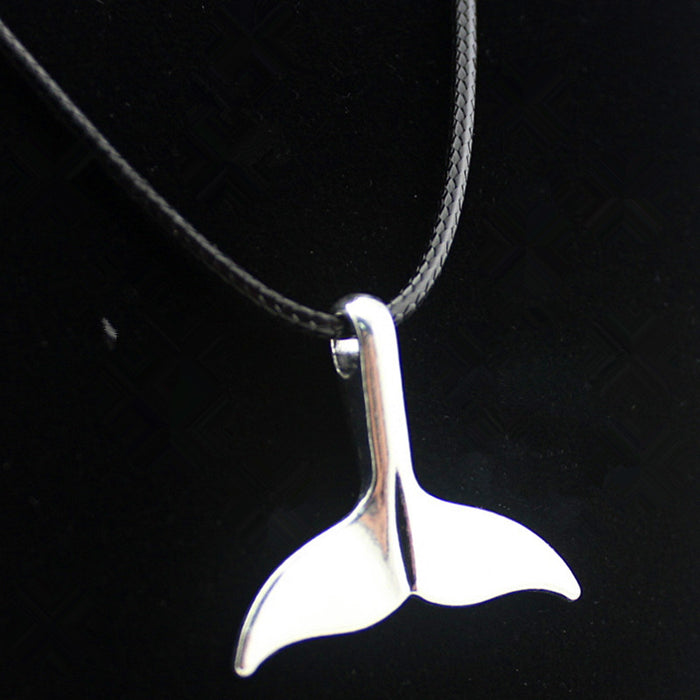 The Voyager Tail – Minimalist Ocean-Inspired Pendant on Braided Leather