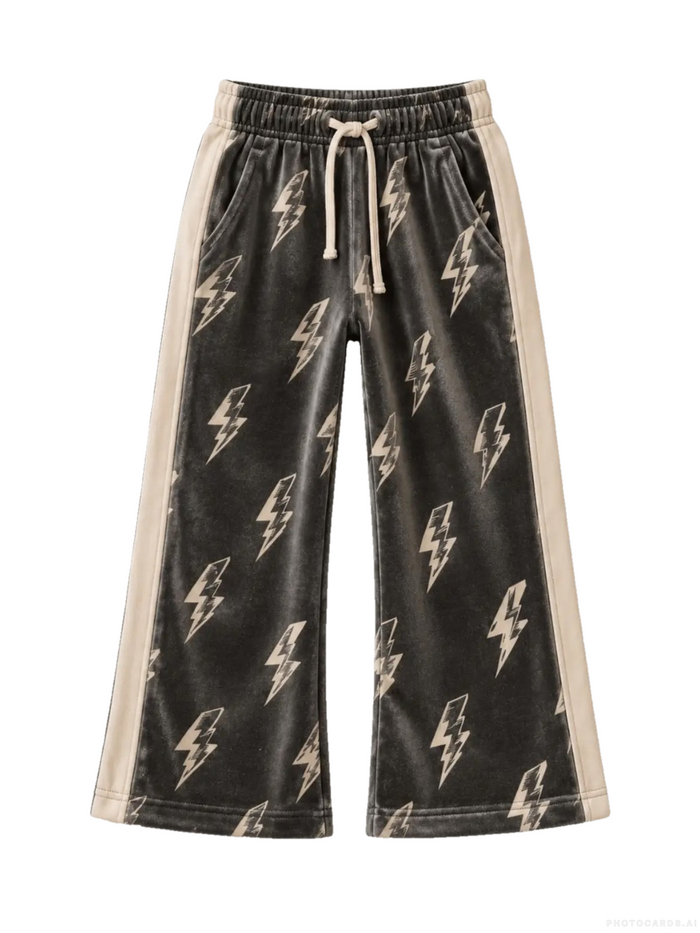 Grey wide-leg pants with an allover lightning bolt pattern and beige side panels, featuring an elastic waistband and drawstring.