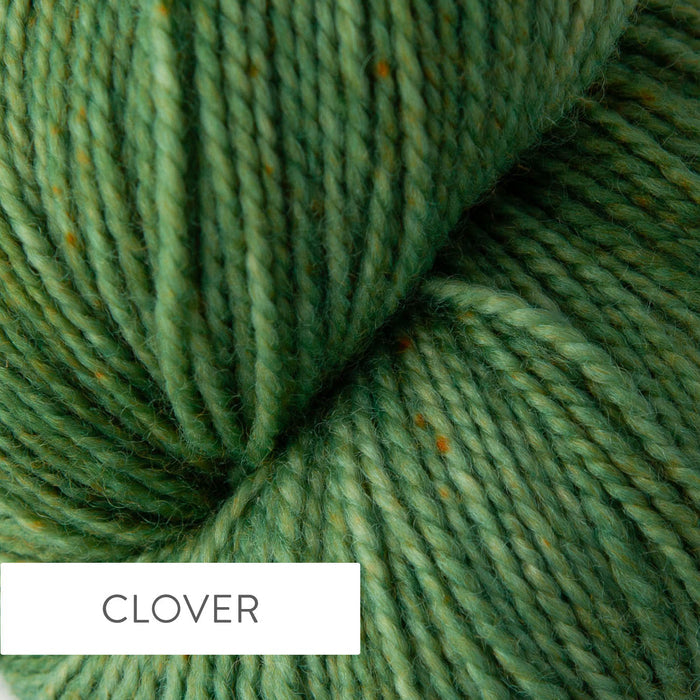 Close-up of TSS Classic Sock yarn in Clover colorway showing the hand-dyed rich green tones