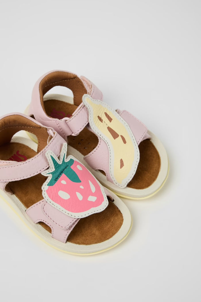 Children's sandals with strawberry and ice cream design on a light gray background