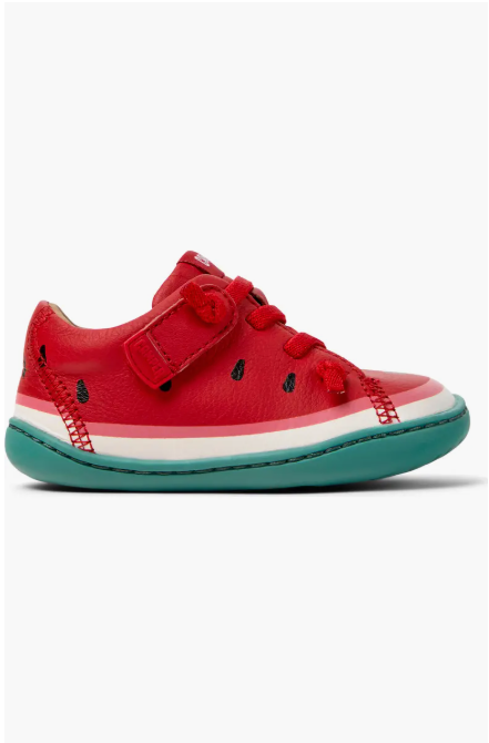 Red children's shoe with watermelon design on a white background