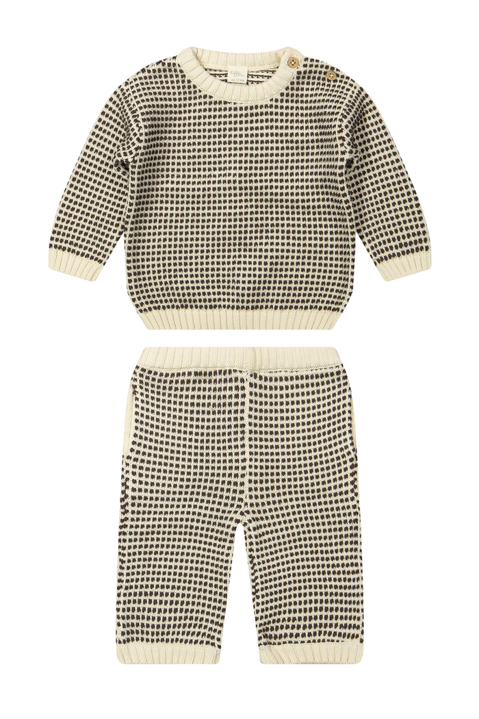Children's knit outfit with top and pants on a white background