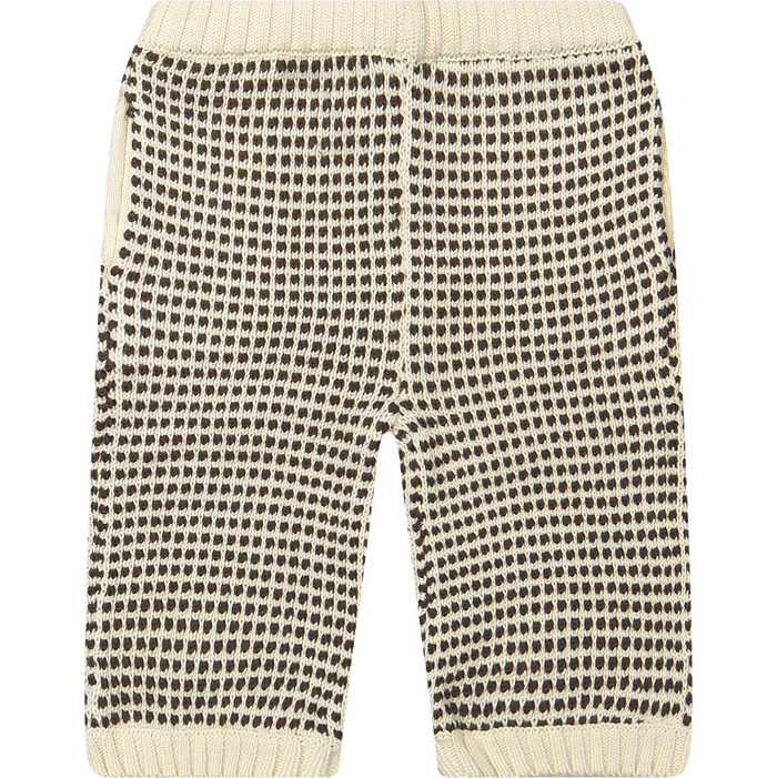 Knitted pants with a brown and white pattern on a white background