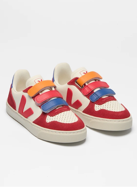 Colorful children's sneakers with multiple straps on a white background