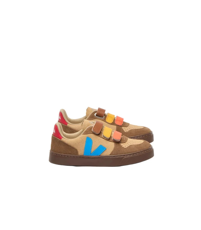 Pair of children's sneakers with colorful accents on a light gray background