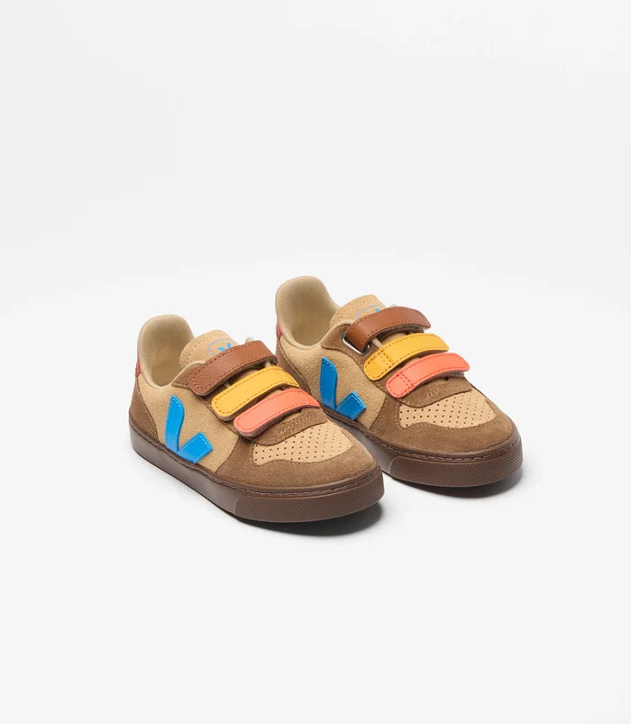 Pair of children's sneakers with colorful straps on a white background
