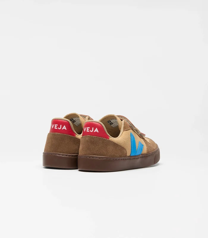Brown sneakers with colorful branding on a white background
