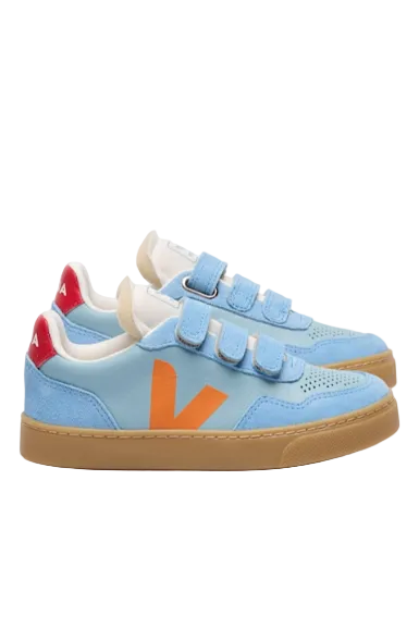 Pair of blue children's sneakers with orange logo on a white background