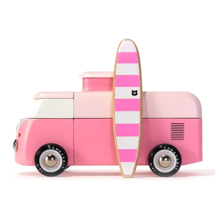 Pink toy car with a striped surfboard on a white background