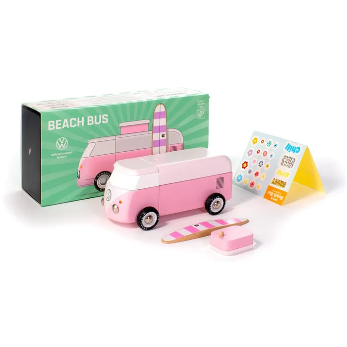 Pink toy bus with packaging on a white background