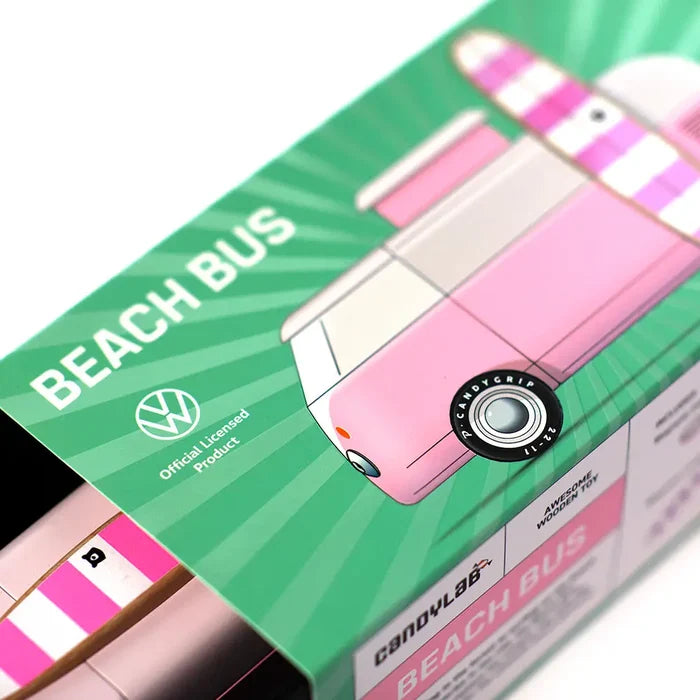 Pink toy bus with green packaging labeled 'Beach Bus' and 'CandyLab'.