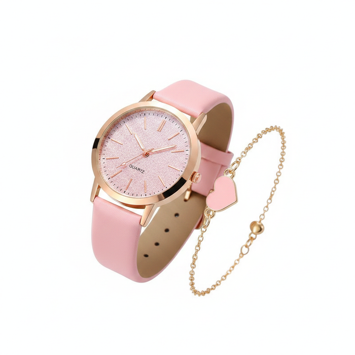 A feminine watch and bracelet pairing featuring a rose gold-toned case with a shimmering glitter-pink dial and a matching leather strap, accompanied by a delicate gold-toned heart charm chain for a playful yet sophisticated editorial look.