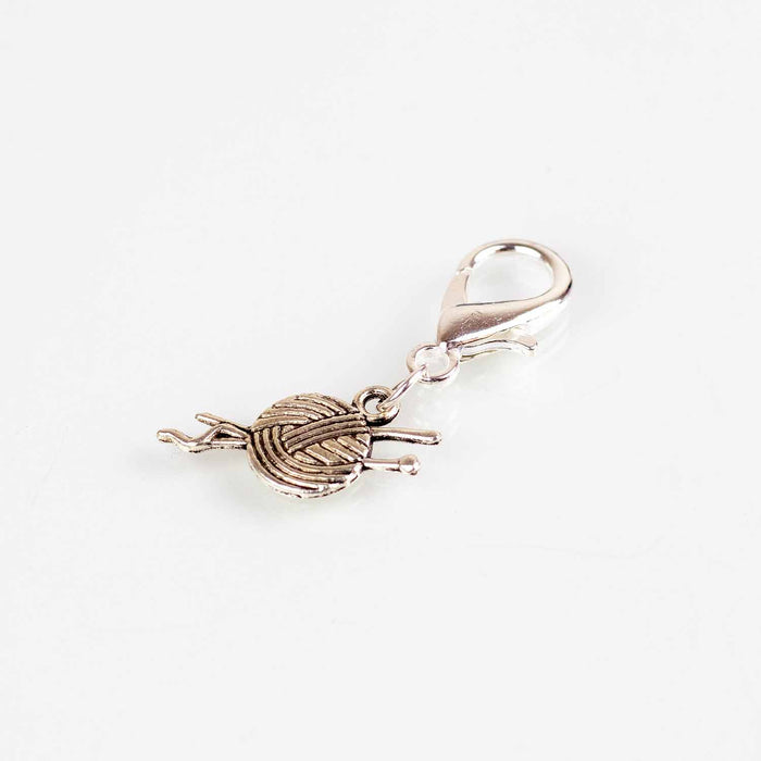 Silver yarn ball and knitting needle charm on lobster-clasp stitch marker