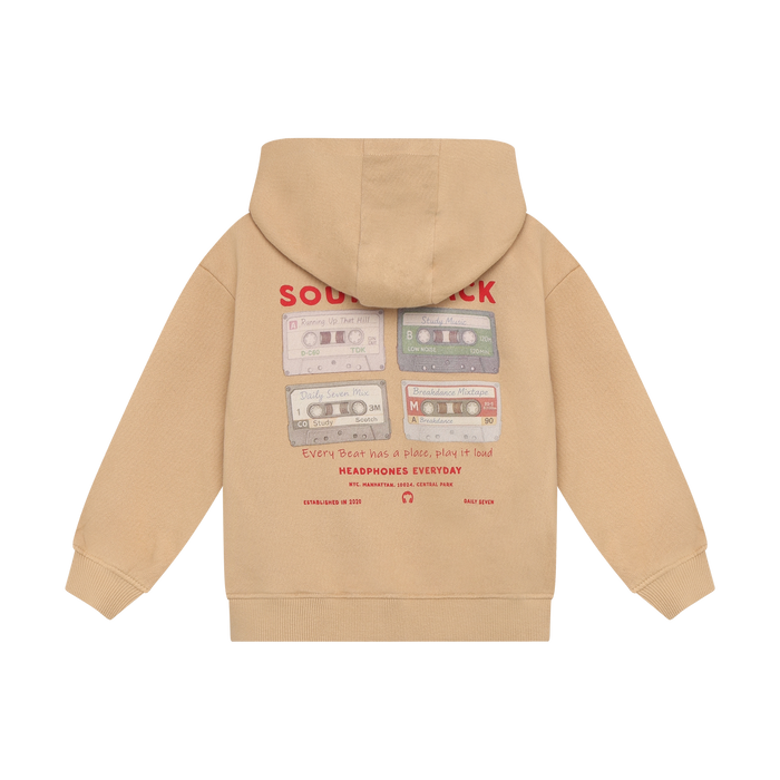 A beige hoodie shown from the back, featuring a vintage cassette tape graphic with red text that reads 'SOUL' and 'Every Beat has a place, play it loud" HEADPHONES EVERYDAY'.