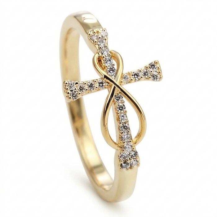 Gold infinity cross ring on pure white background with diamond pave accents along cross design, polished band, intertwined infinity symbol, religious faith jewelry